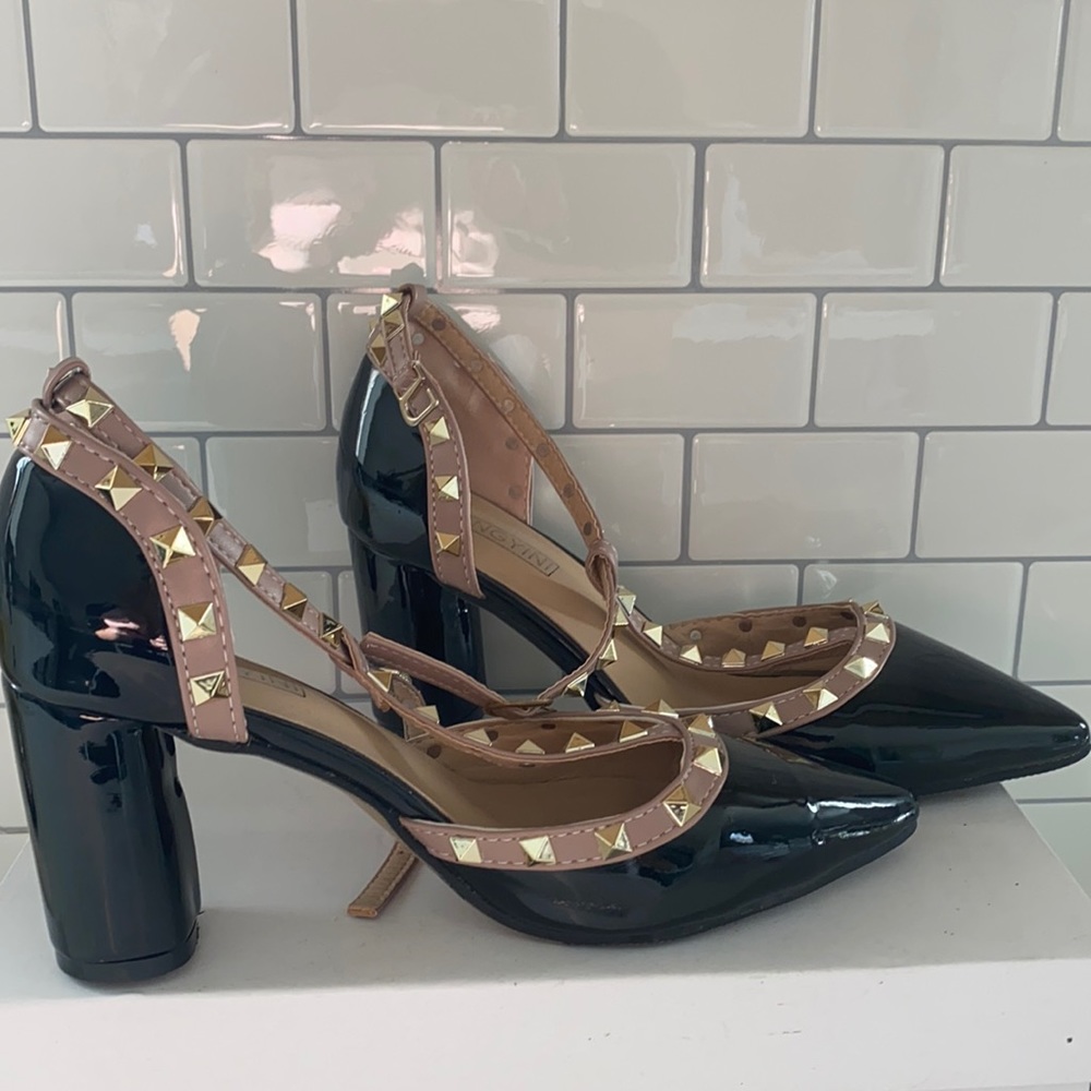 Black Roman stud heels